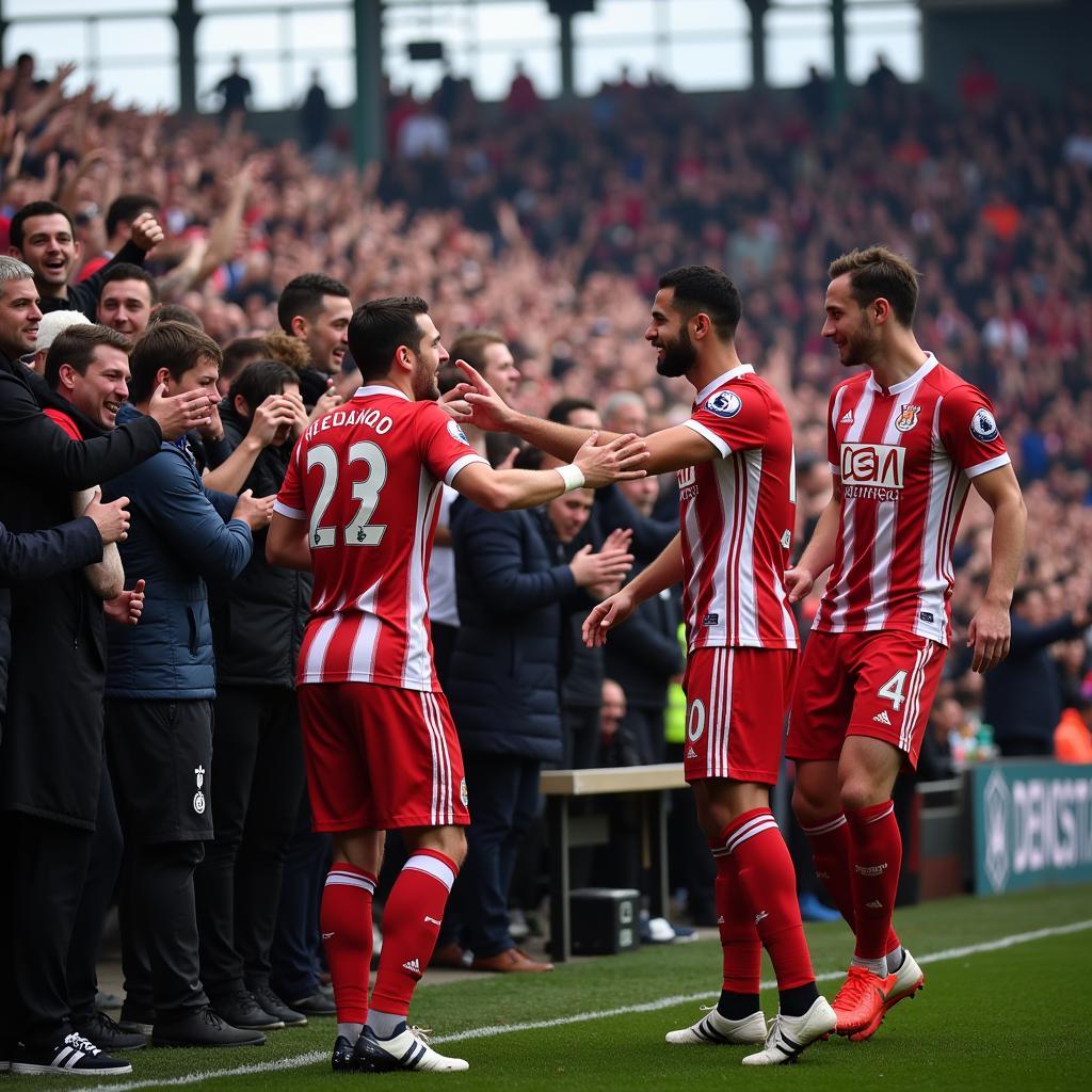 Cầu thủ Stoke City ăn mừng chiến thắng cùng người hâm mộ, bài hát CLB vang lên